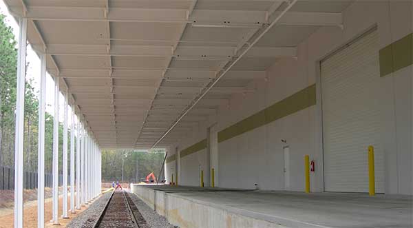 Rail loading dock canopies